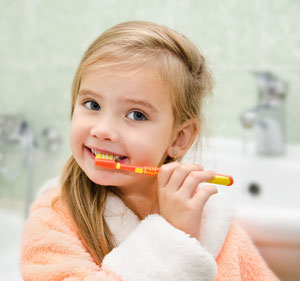 Girl brushing - Pediatric Dentist in Gulfport, MS